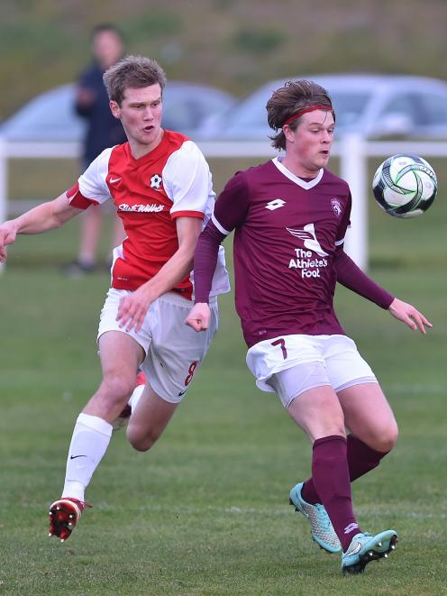 Caversham’s Andrew Ridden challenges Dunedin Technical’s  George Thrussell during their southern...