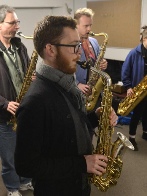 Rodger Fox Big Band saxophonists Bryn Van Vliet (foreground) and fellow band members (from left)...