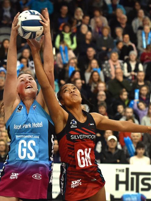 Southern Steel goal shoot Jennifer O’Connell (left) grabs the ball despite the attentions of...
