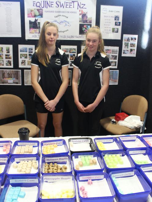 Equine Sweets NZ owner Hannah Nicol (right) and friend Philippa Stratford (14), both of Invercargill, sell sugar cubes at the Equine Expo at Otatara recently. Photo: Nicole Sharp