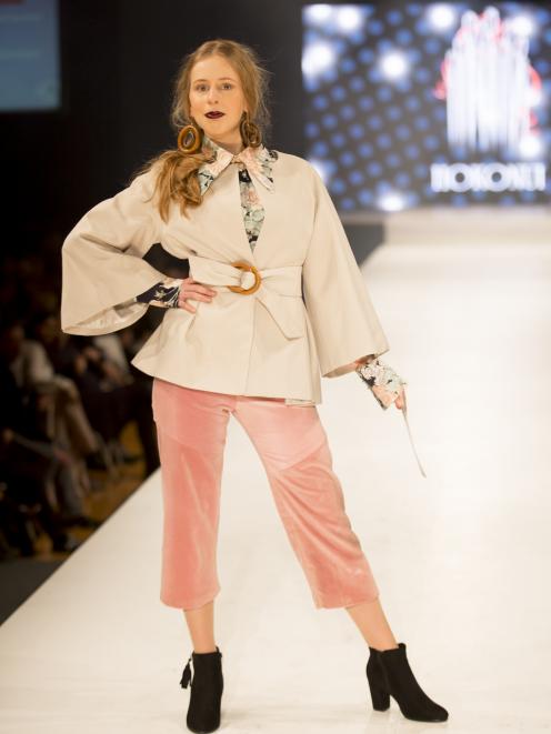 Linda Bos models the winning entry, created by Sonya Leusink Sladen, of Nelson, in the Recycled...
