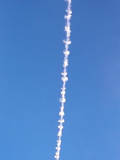 The trail above Dunedin from Saturday's Santiago to Sydney Qantas Boeing 747 is already forming...