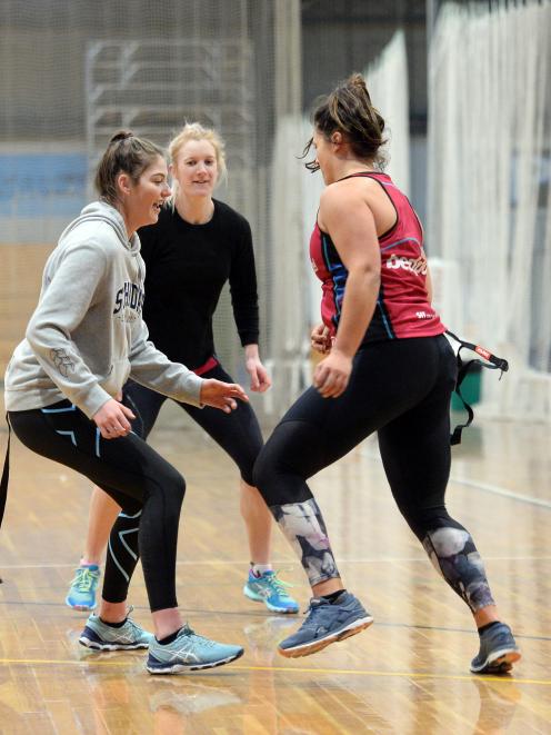 Southern Steel players (from left) Georgia Heffernan, Shannon Francois and Olivia Bates take part...