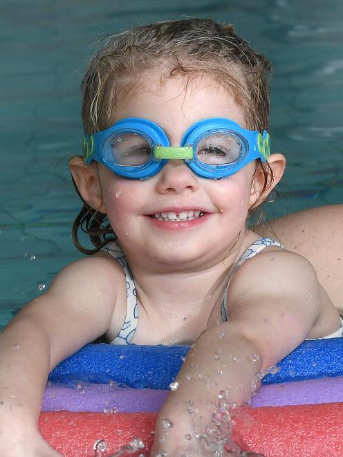 Samantha Ford (2) is all smiles as she tries out the Dunedin City Council's new Just Swim...