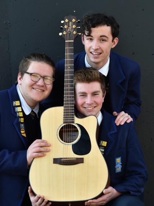 Bark Like a Dog band members (clockwise, from left) Alex Cochrane (acoustic guitar), Josh Glennie (acoustic guitar and lead vocals) and Matthew Reid (bass guitar and vocals) have been selected to compete in the national final of the 2018 Smokefreerockques