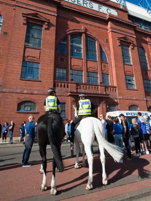 Mounted police on duty at Ibrox Stadium, Glasgow. Photo: Getty Images