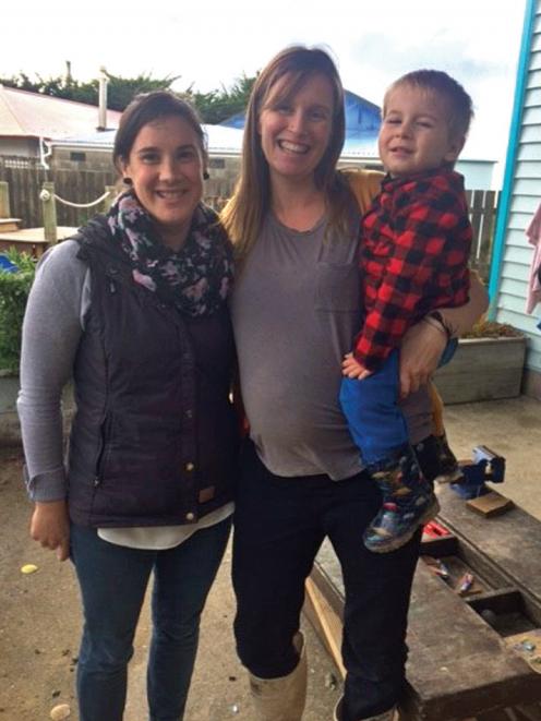 Awarua Whanau Services registered nurse Cara Morton and Stewart Islander Karin Lewis with son...