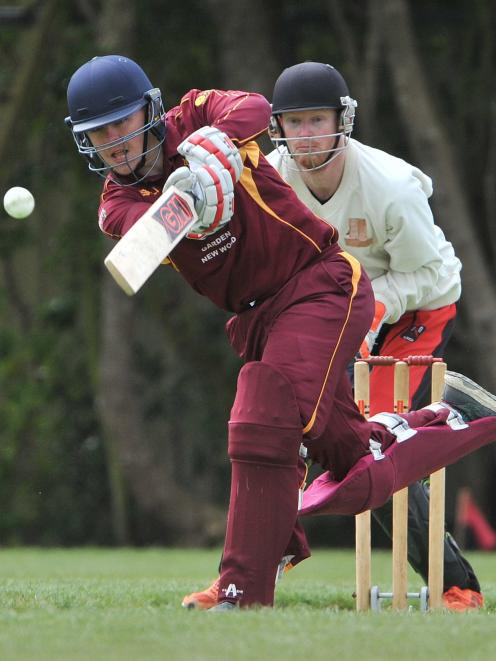 North East Valley batsman Tom Griffin drives the ball during a senior grade game at Culling Park...
