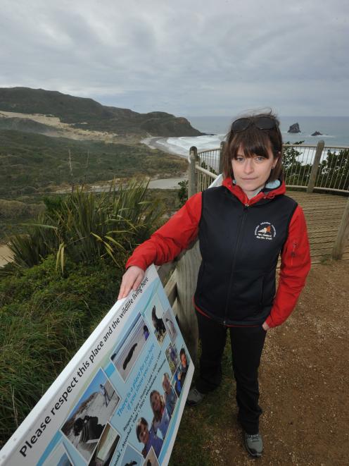 New Zealand Sea Lion Trust chairwoman Jordana Whyte yesterday at Sandfly Bay, the site of several...