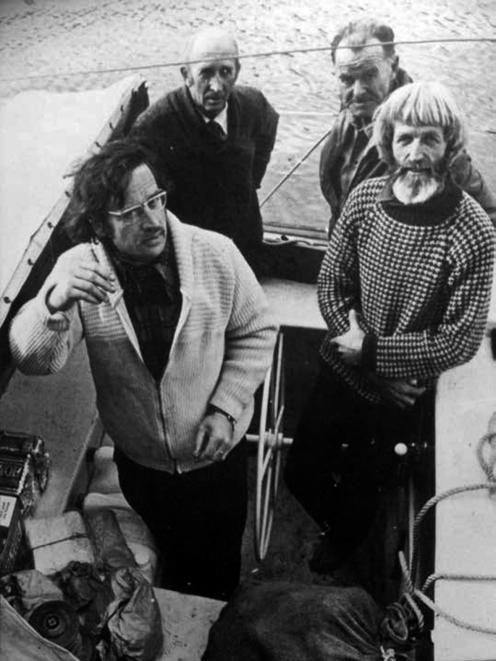 Shadbolt (left) aboard the yacht Tamure with (clockwise from back left) Jim Sharp, Jack Harker...