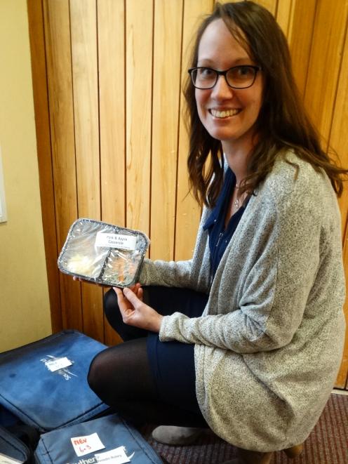 Age Concern Otago Meals on Wheels co-ordinator Fiona McMillan checks on piping-hot meals awaiting delivery at the central city depot. Up to 50 additional Meals on Wheels drivers are needed to meet demand. Photo: Brenda Harwood