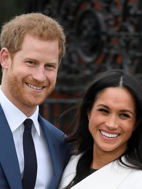 Prince Harry with Meghan Markle. Photo: Reuters 