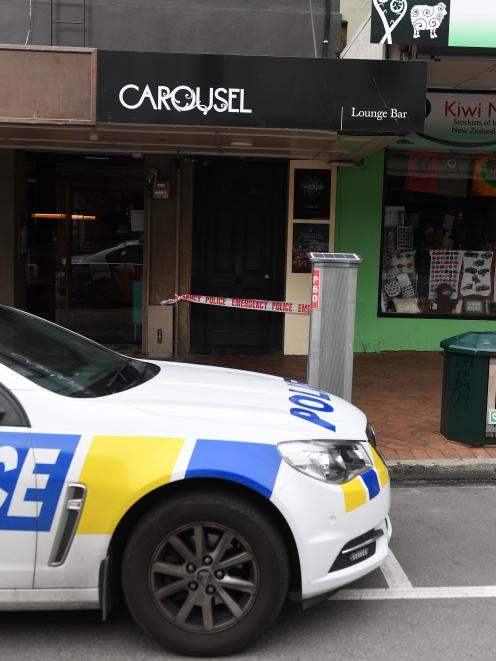 A police car at the scene in Lower Stuart St this morning. Photo Stephen Jaquiery
