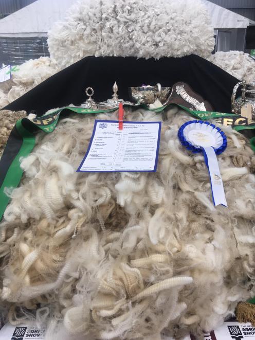 The Paterson family, from Armidale, in the Maniototo, won supreme champion fleece at the New...