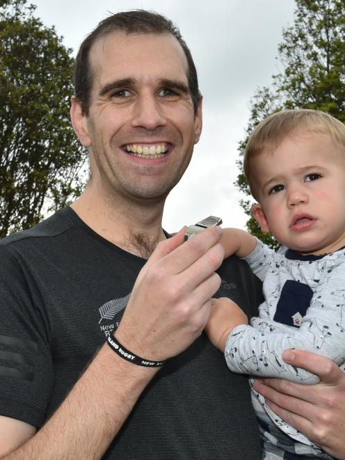 Jono Bredin and son Nixon at home this week. Photo: Gregor Richardson