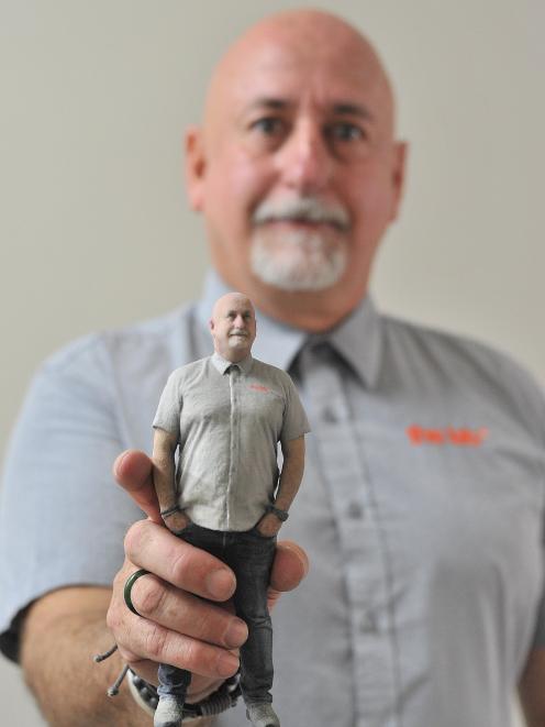 The Lab's new venture into 3-D printing will give people the opportunity to own a miniature version of themselves, much like the one company director John Preddy has of himself. Photo: Christine O'Connor