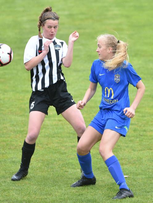 Northern’s Ava Pritchard (left) and Southern United’s Emily Morison in action during their...