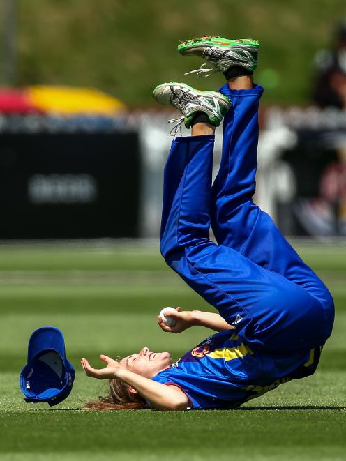 Kate Heffernan, of Otago, takes a catch to dismiss Amelia Kerr, of Wellington, during the T20...