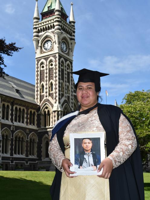 Salote Makasini holds a photograph of her Tongan cousin Rima Sikei who died a week ago. Photo:...