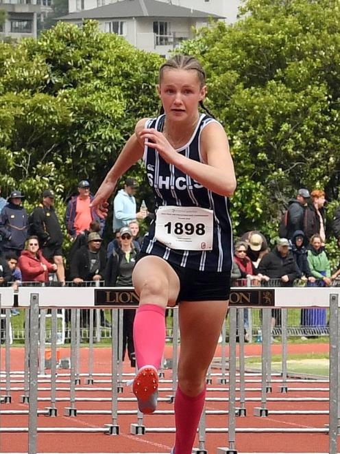 Sarah Langsbury leads the 80m hurdles at the national secondary school athletics championships in...