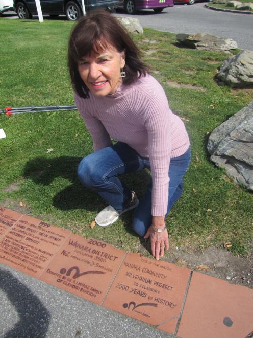 Liz Hall, co-ordinator of the Millennium Walkway project, is concerned the tiles are to be dug up. Photo: Mark Price