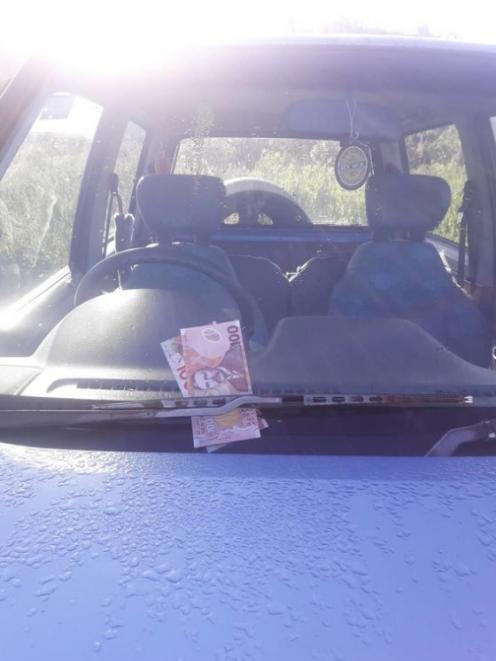 Money was left under the windscreen wipers of the cars at the campground near Westport. Photo:...