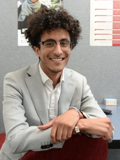 Red Cross Otago youth co-ordinator Sakhr Munassar sits at his workplace. PHOTO: LINDA ROBERTSON