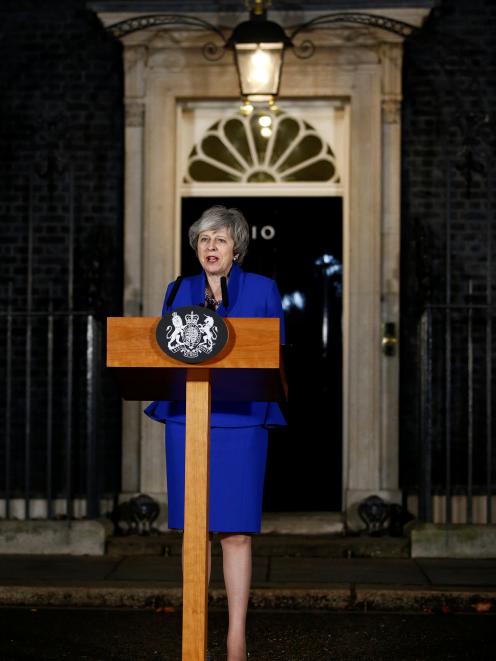 Theresa May makes a statement back at Number 10 Downing Street after winning the confidence vote....