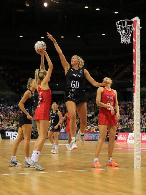 Helen Housby of England Roses lines up a shot challenged by Casey Kopua of the New Zealand Silver...