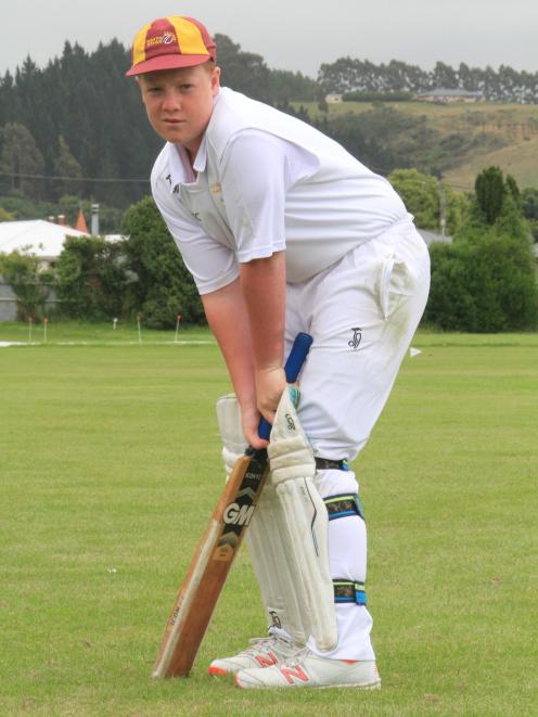Toby Growcott (13) prepares to face the bowler.