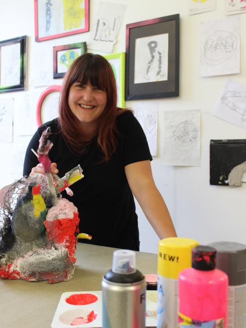 Hannah Breeze with a contempary art piece. Contempary art was about the creative process rather...