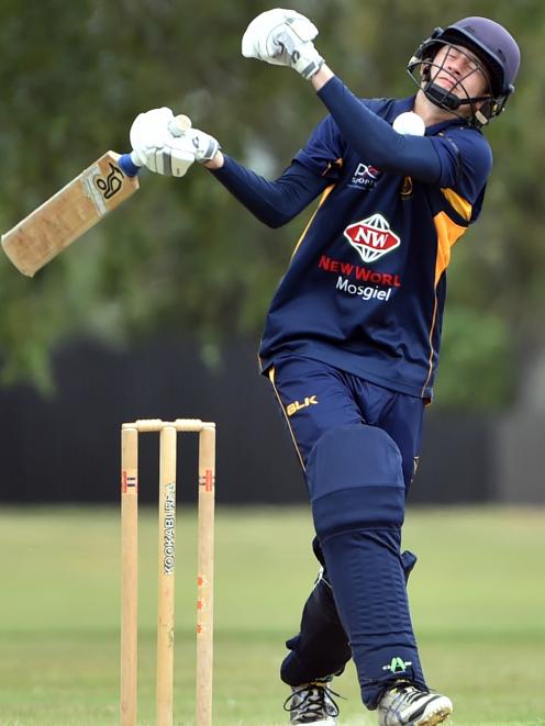 Taieri batsman Cameron Jackson is hit by a delivery under his chin during the regional final of...