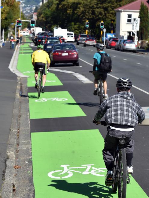 Cyclists use the new southbound cycleway on Cumberland St yesterday afternoon. PHOTO: PETER...