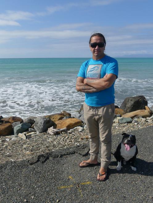 James York and his dog Mana on the Colac Bay foreshore.