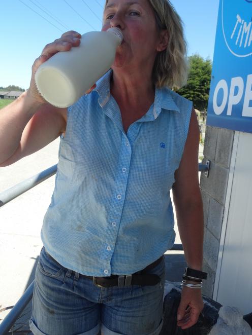 Andrea Weir tries come cool milk on a hot day.