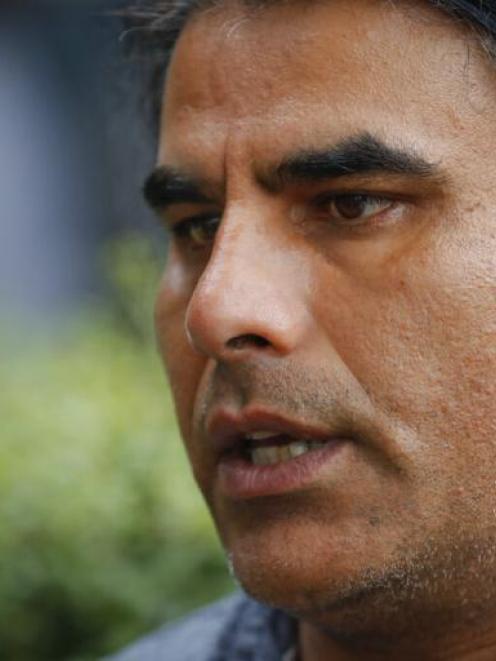 Abdul Aziz, a survivor of the mosque shooting, speaks to Associated Press during an interview in...