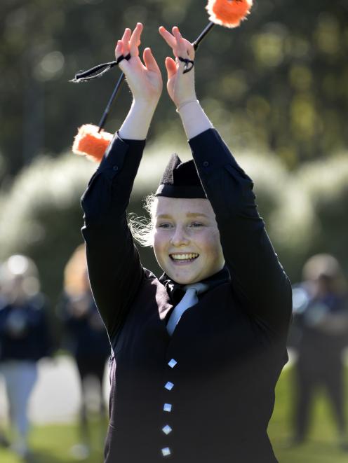 Tenor drummer Hannah Devery (17), of Invercargill, flourishes her drum sticks during the New...