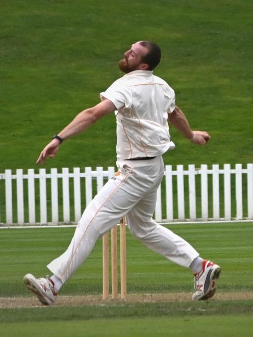 Wellington paceman Iain McPeake bowls against Otago on the second day of their Plunket Shield...