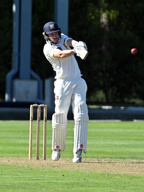 Otago batsman Mitchell Renwick plays the ball on to the onside during his maiden first-class...