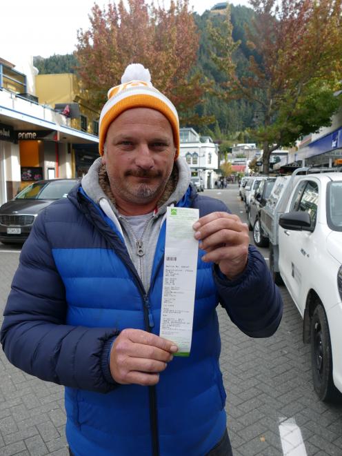 Arrowtown resident Glen Wallace and his fine for ``freedom camping'' on Rees St. PHOTO: GUY...