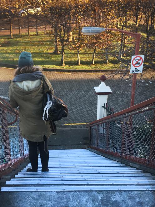 Stacey Fraser, of Dunedin, pauses before continuing descending a very frosty historic Dunedin...