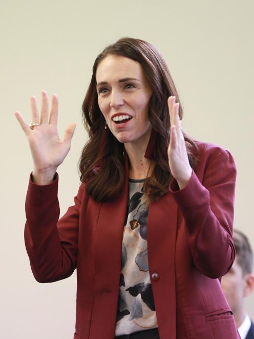 New Zealand Prime Minister Jacinda Ardern speaks to people upon arriving at the Mangere Community...