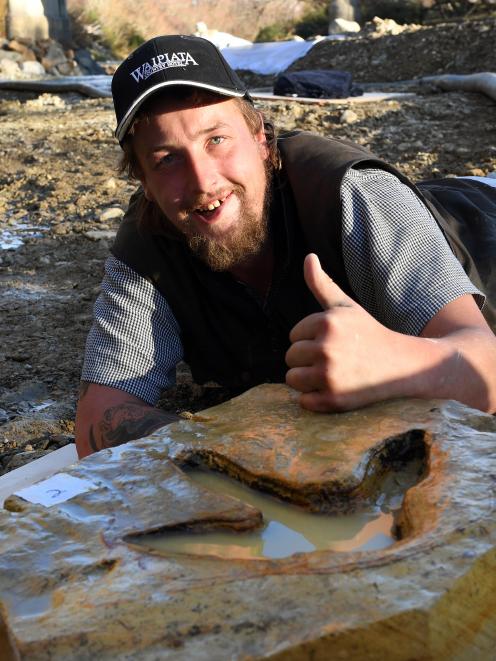 Ranfurly man Michael Johnston with moa footprints he found in the Kyeburn River. Photo: Stephen Jaquiery