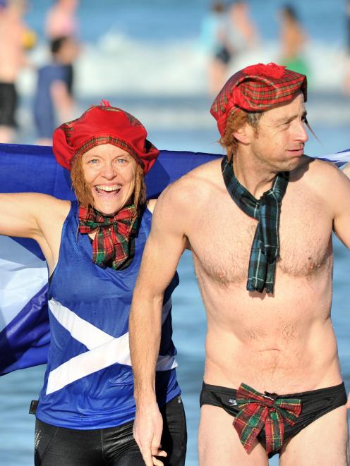 Proud Scots Karen Blackwood and Stephen Colpitts rise from the freezing waters of St Clair...