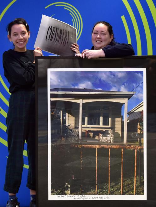 Otago Polytechnic art students Zoe Morehu (left) and Hayley Walmsley with their exhibits to be showcased in "Hopua Whakaata'', which will open on Thursday. Photo: Peter McIntosh