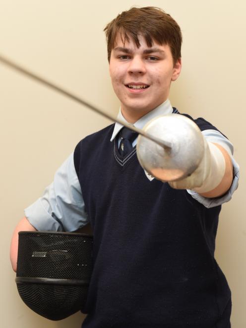 King's High School's Corey Symon (17) takes a break from school before leaving for the Australian under-17 national fencing championships last week. Photo: Gregor Richardson