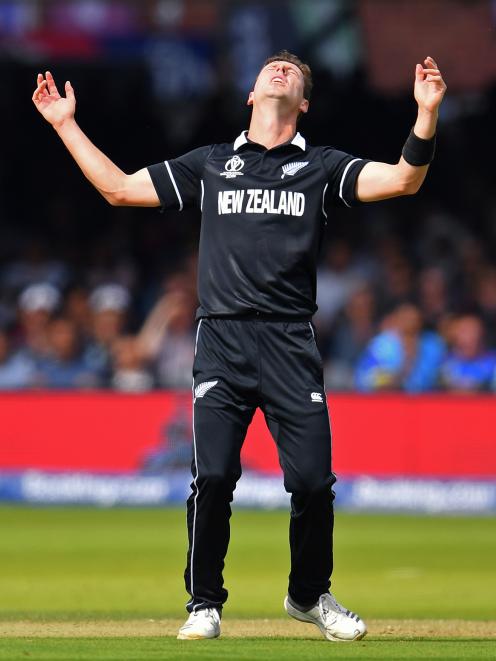 Black Caps fast bowler Matt Henry reacts to a missed opportunity during the Cricket World Cup...