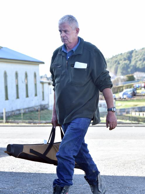 Laurence McGuire, of Moeraki, heads in to the Palmerston Sports Hall in Palmerston yesterday to...