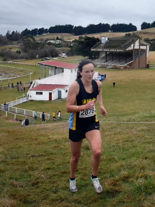 Senior women's winner Rebekah Greene calls on all her reserves on the steep climb at the top of...