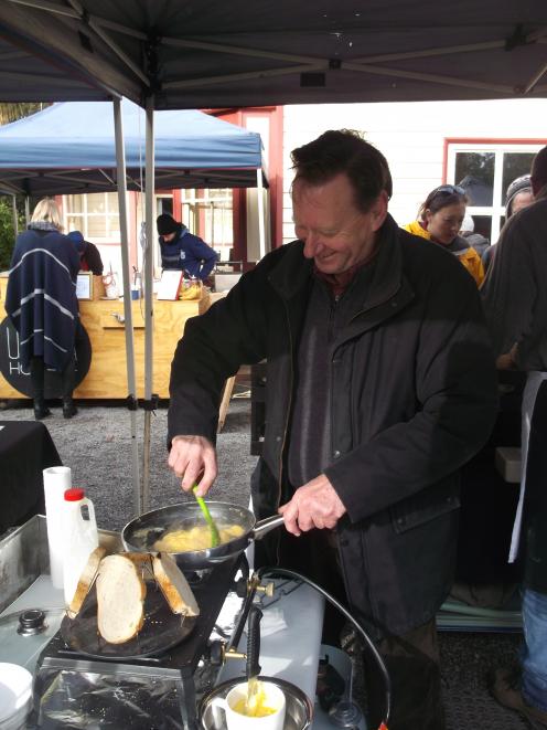 Jeff Weston, of West Melton, cooks up some truffled eggs at the Christchurch Farmers' Market during a past Canterbury Truffle Festival. Photo: Allied Press Files